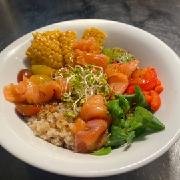Quinoa Bowl with cherry tomatoes, avocado, baked corn and peppers