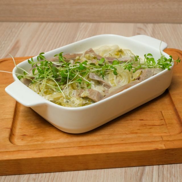 Язик тушкований