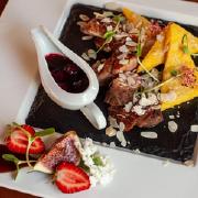 Duck fillet with palenta and cherry sauce