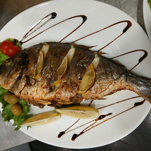 Baked sea bream with vegetables